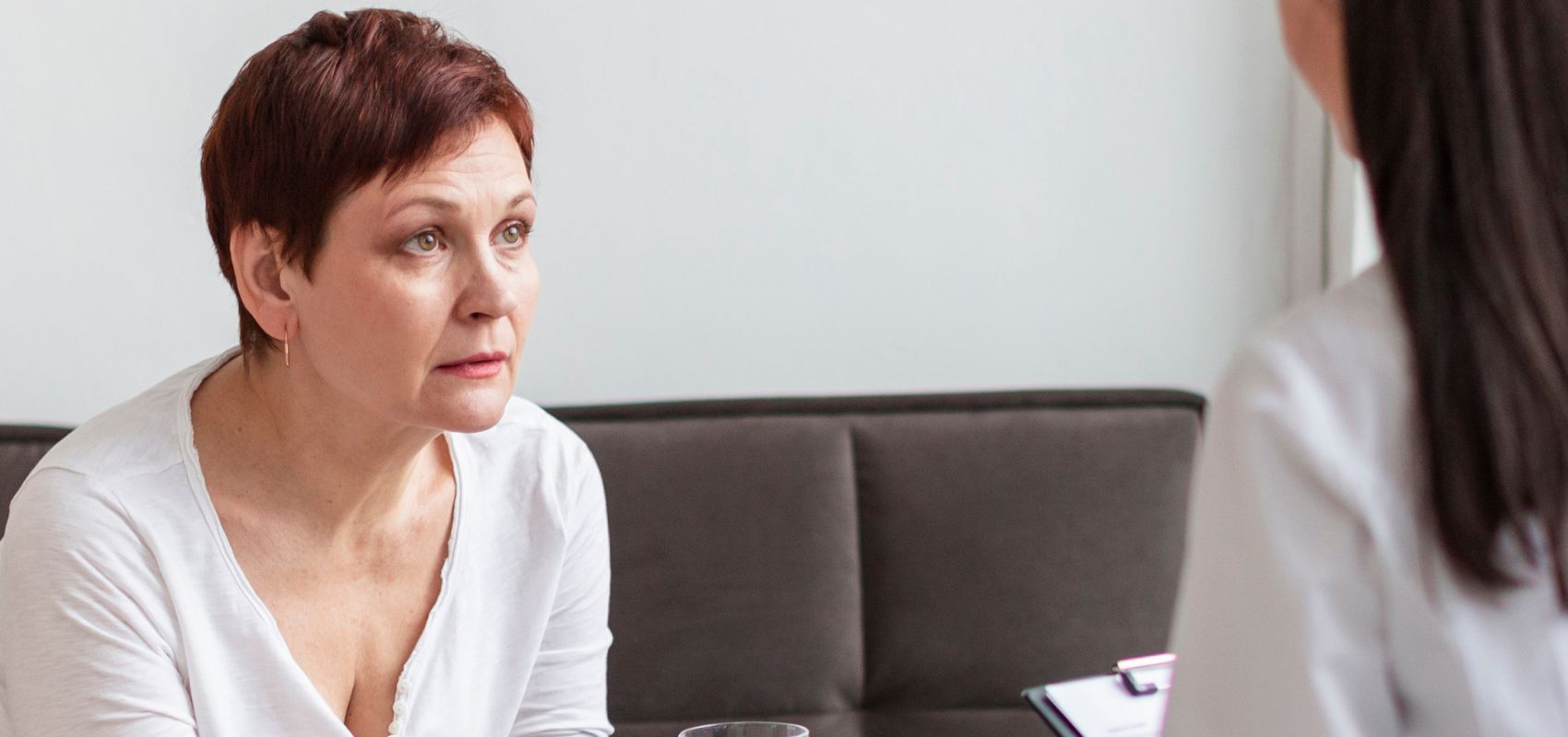 a woman talking to a medical doctor